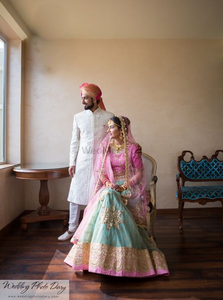Bride in Pale Blue and Light Pink Bridal Lehenga
