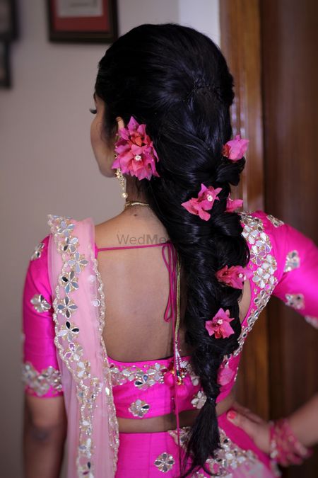 Mehendi braid with big pink flowers
