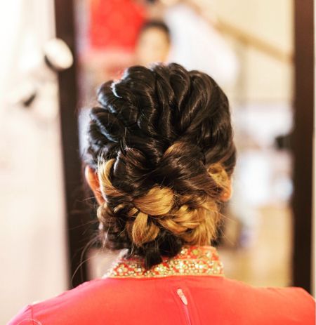 Twisted knotted bun for sangeet or reception
