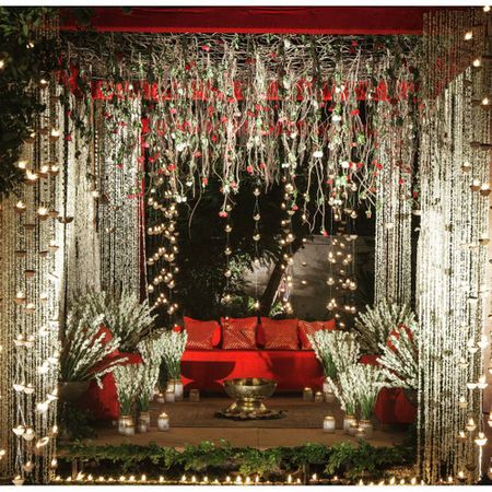 Photo of red and white engagement decor