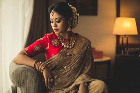 South Indian bridal portrait with contrasting blouse