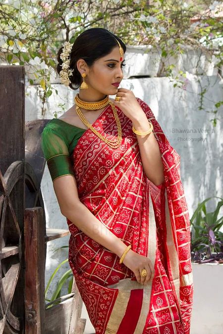 Red and White Saree with Green Blouse