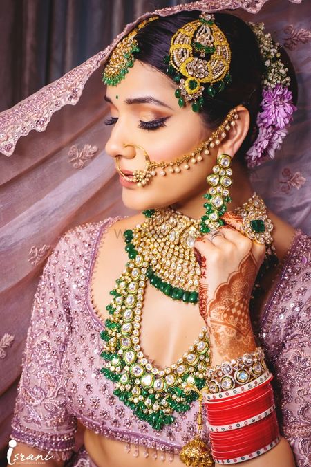 Bride in exquisite Kundan statement jewellery 