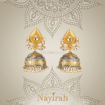 Photo of gold and silver jhumkis
