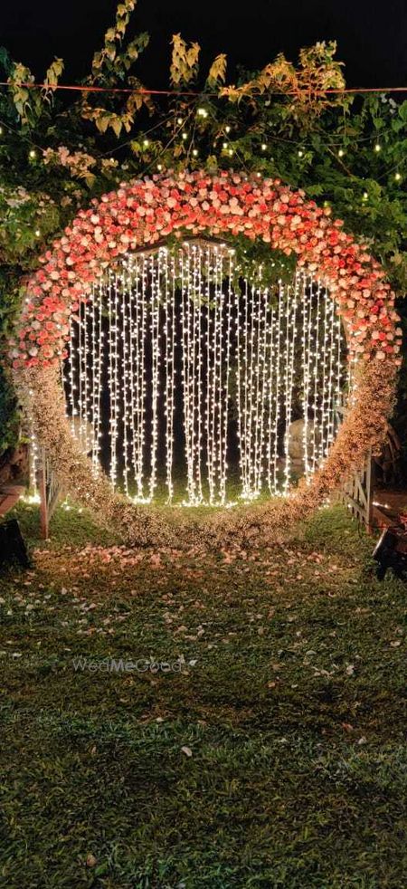 Floral wreath photobooth with fairy lights