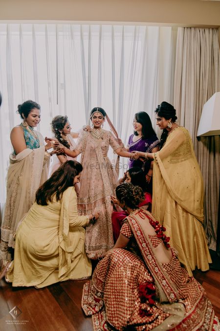 Photo of A bride has the complete army of her bridesmaids.