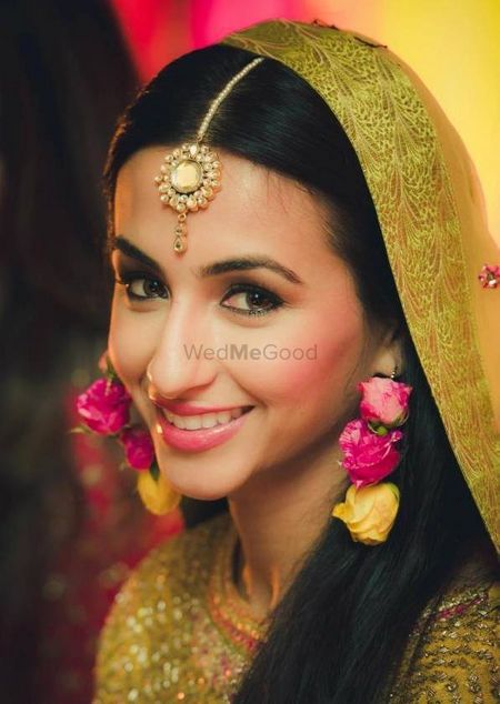 Photo of Pink and Yellow Floral Earrings for Mehendi