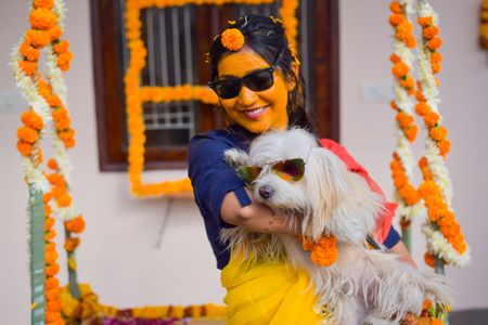 Bride with dog on haldi