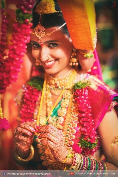 A south indian bride in a kanjeevaram and temple jewellery