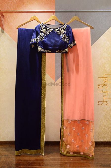 Photo of dark blue and pastel pink saree