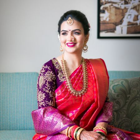  Gorgeous Maharashtrian bride in red nauvari and purple blouse & shela