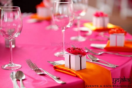 Photo of orange and pink table cloth