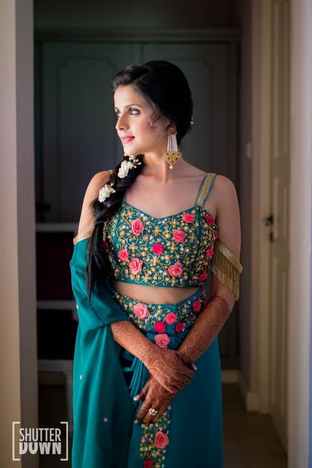 Teal mehendi outfit with side braid 