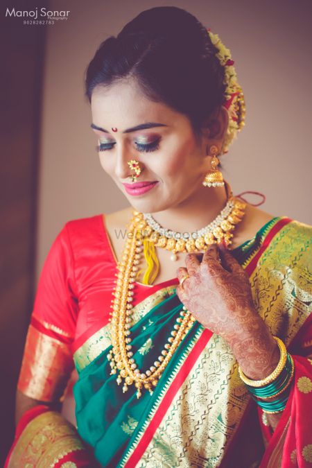 Photo of A Maharashtrian bride in a saree for her wedding day