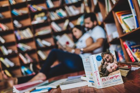 Library pre wedding shoot idea with books