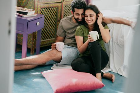 pre wedding couple shoot at home with coffee