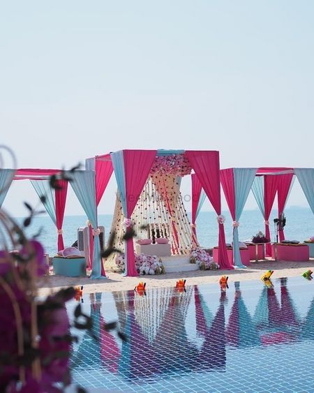 bright pink and light blue theme mehendi decor seating idea for bride