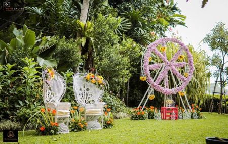 elegant whimsical mehendi seating idea and floral decor