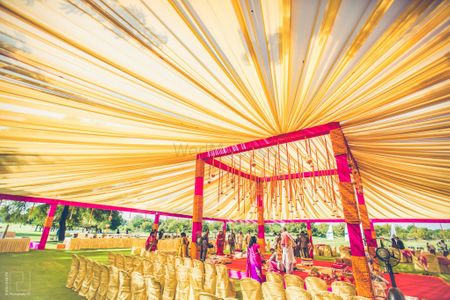 Gold Canopy and Pink Mandap Decor with Kaleere