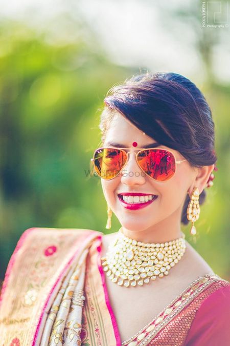 Indian bride with aviator sunglasses