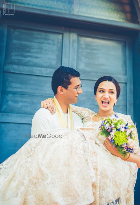 Groom Carrying the Bride Shot