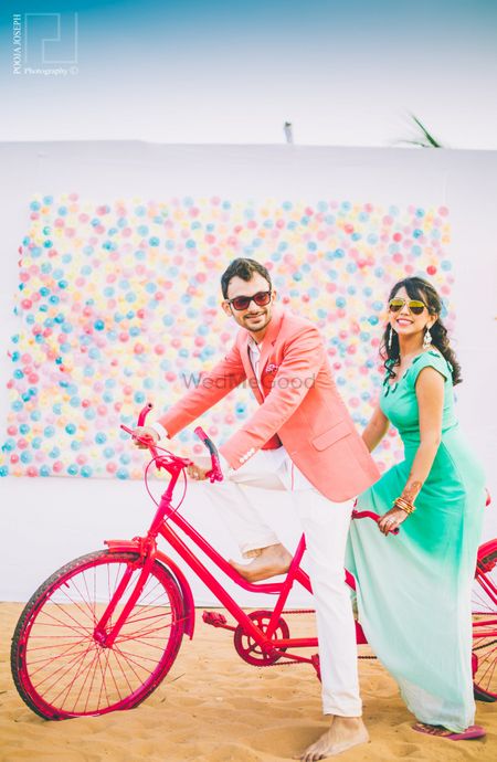 Colourful Pre Wedding Shoot with Cycle and Balloon Wall