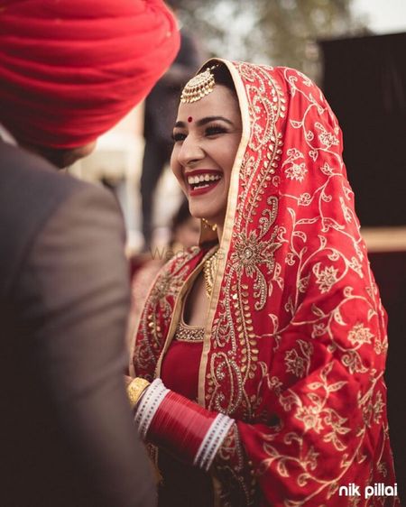 Photo of bride laughing shot