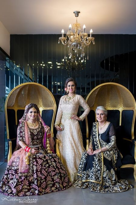 Bride with mother and sister on wedding day