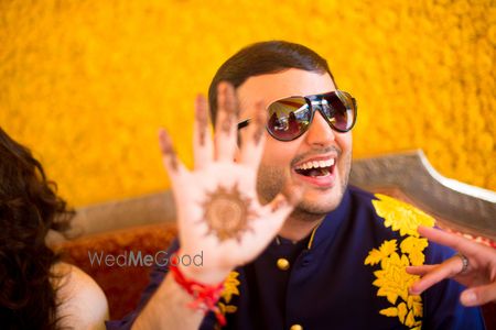 Groom showing off mehendi