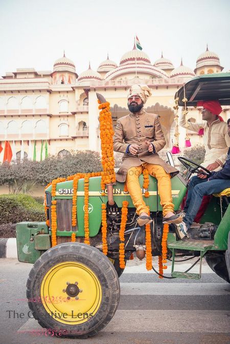 Groom entering sitting on a tractor