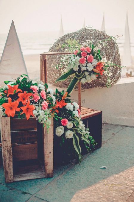 Wooden crated with floral arrangements