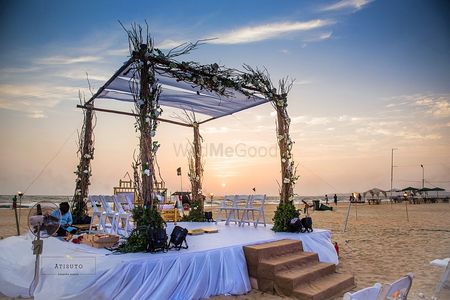 Simple mandap for beach wedding with twigs and greens