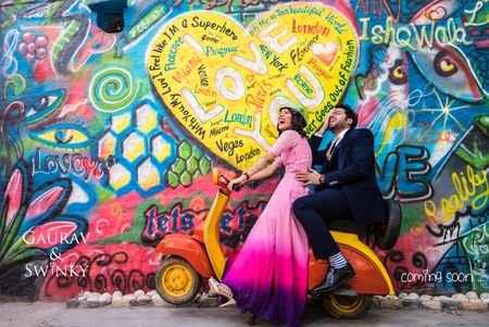 Cute pre wedding shoot idea with graffiti wall and scooter