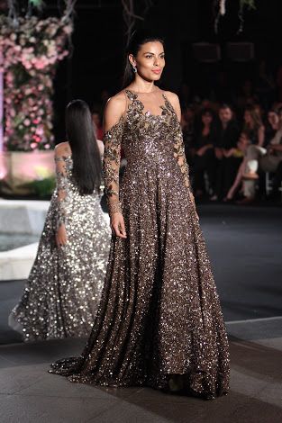 Photo of Dark grey sequin evening gown with cold shoulder