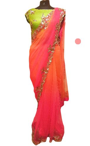 Photo of lime green and ombre pink and orange georgette saree with scalloped silver embroidery border. crop top blouse. friend of the bride
