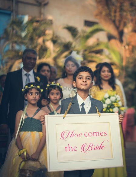 Photo of Bridal Entry With Flower Girls and Message Board