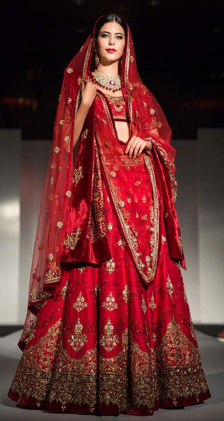 Bright red bridal lehenga with silver motifs
