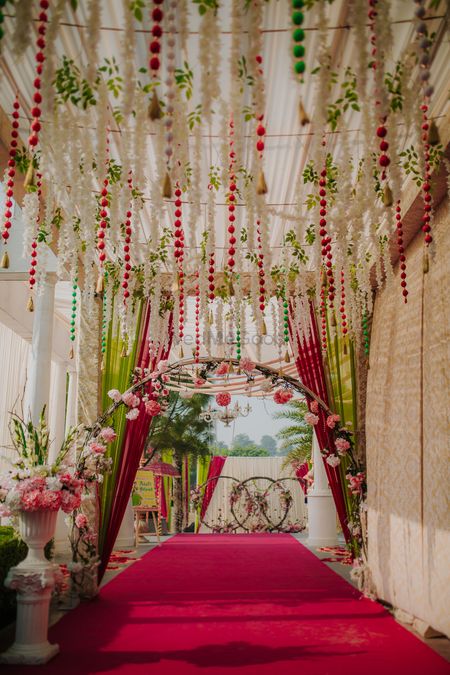 Photo of Decor for entranceway with hanging floral strings