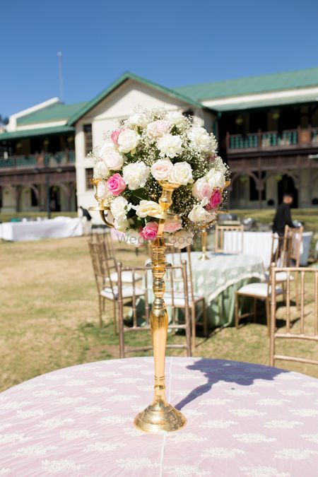 Photo of Gold Candelabras with Floral Bouquet Decor