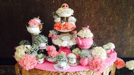 Dessert table setup with cupcakes