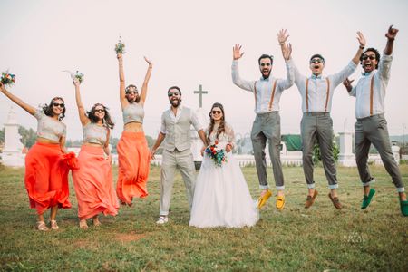 Photo of Colour Coordinated Bridesmaids and Groomsmen