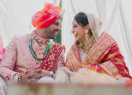 Photo of happy matching couple shot on wedding day