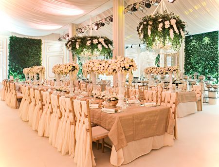 Photo of Glamorous table seating for reception green and white