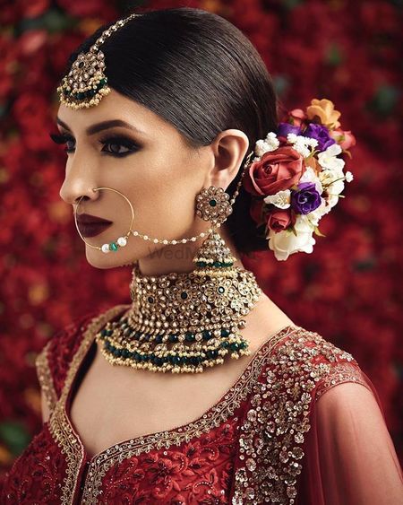 Bridal choker jewellery with cool floral bun 