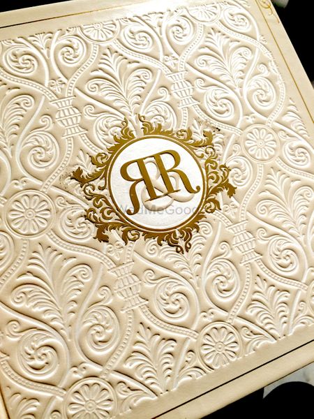 Photo of Elegant white card with initials as motif on card