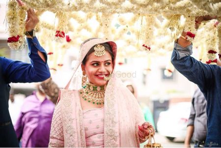 Photo of Happy bride shot while making entry