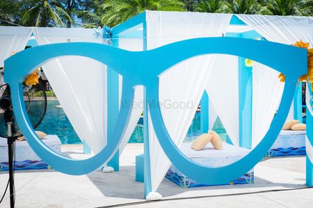 Light blue giant sunglasses prop for pool party