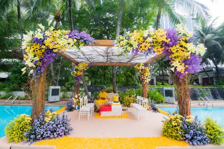 Photo of Floral and bright mandap for destination wedding