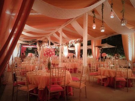 Coral and white theme wedding tents decor