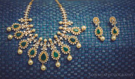 bridal diamonds and emerald green necklace and earrings